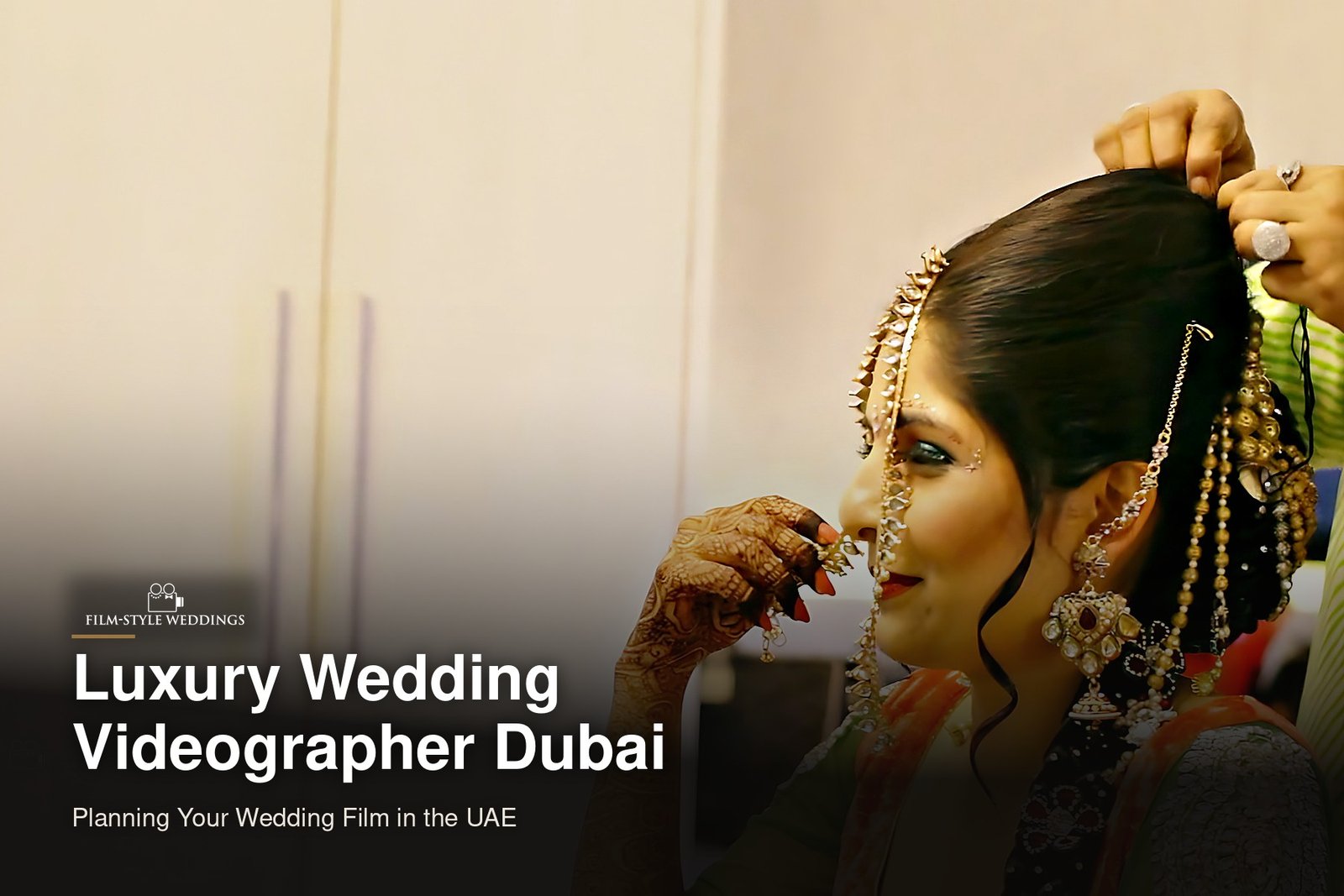 Luxury wedding videographer Dubai guide cover: a bride getting ready as her jewellery is placed